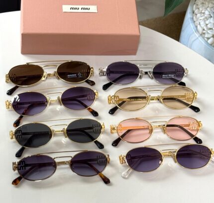 Miu Miu Oval Sunglasses
