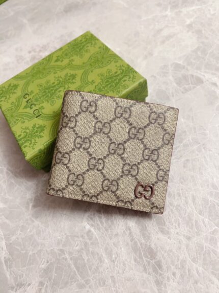 Gucci GG Supreme Bifold Wallets