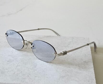 Miu Miu M176 Oval Rimless Sunglasses