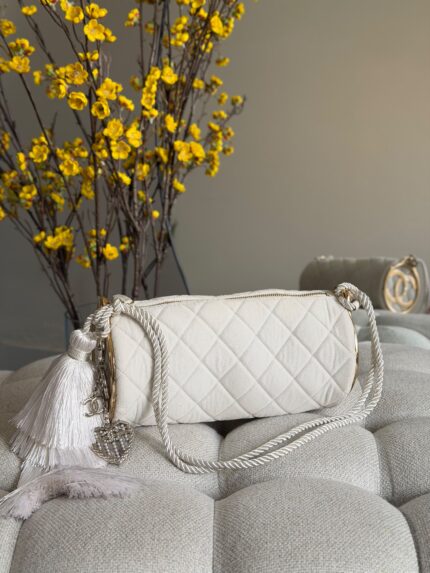 Chanel Quilted Suede Cylinder Barrel Bag with Tassel Charm