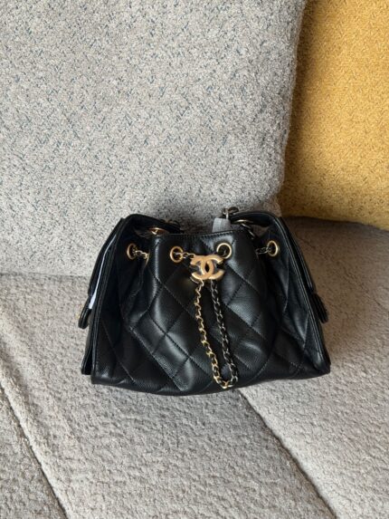 Chanel Quilted Drawstring Bucket Bag With Dual Gold CC Logo Chain